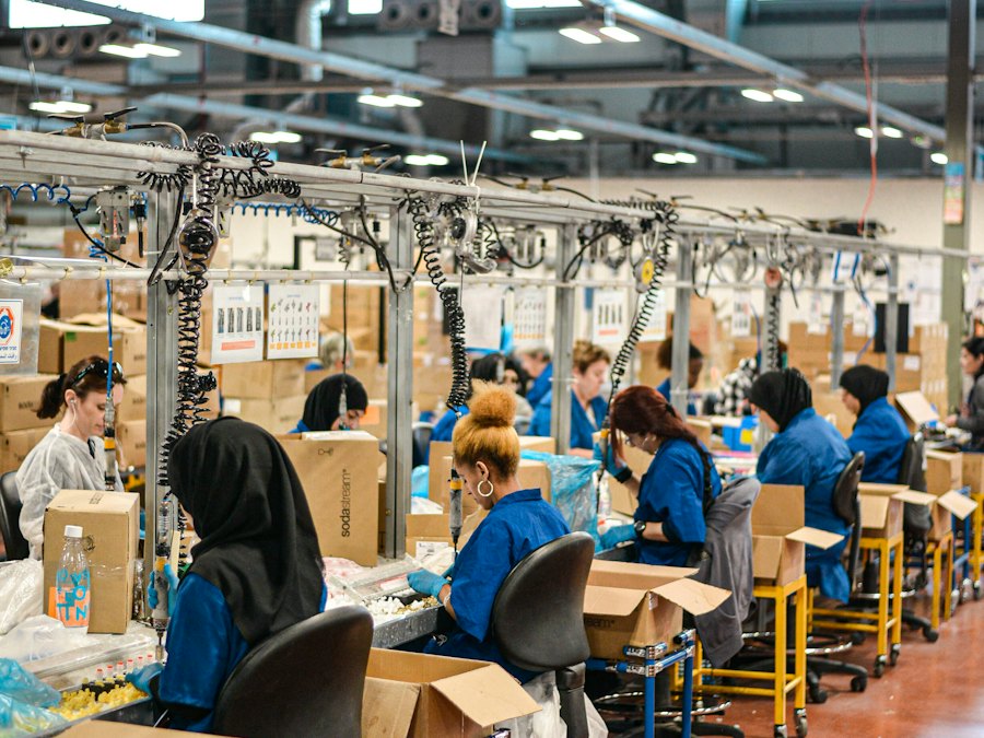 Workers on an assembly line in a factory